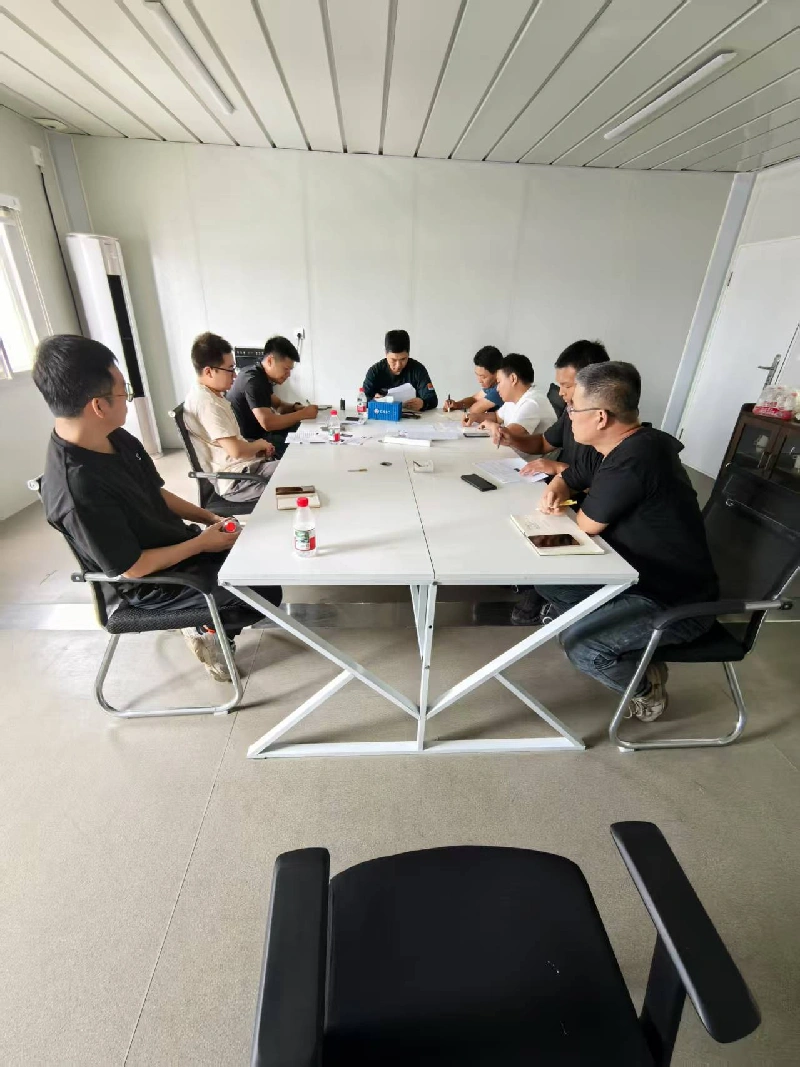 Точно привеждане в съответствие с изискванията за поръчка на контейнери за жилища и укрепване на производствените фондации чрез срещи за обмен на качество